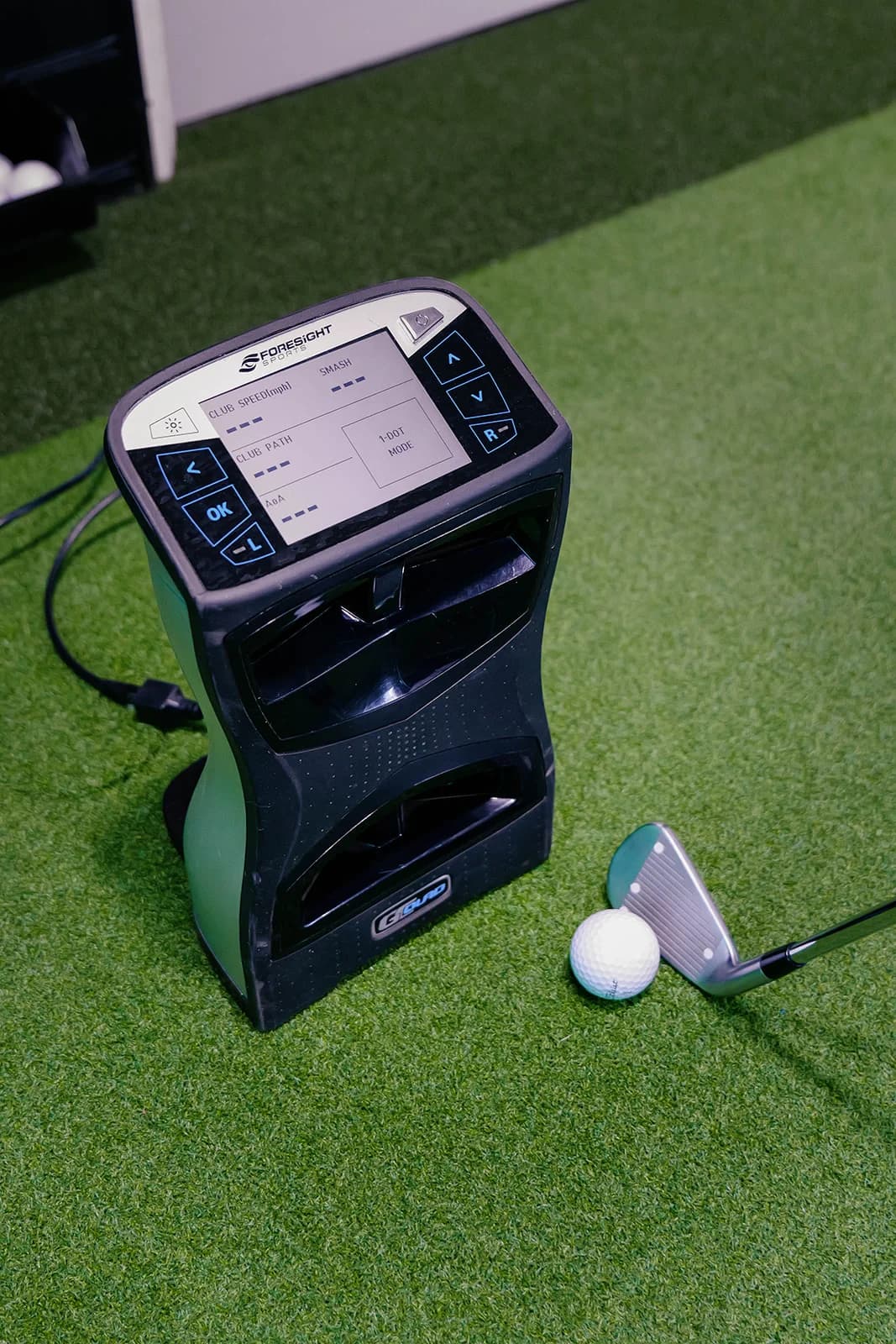 The Foresight GC Quad launch monitor on the studio floor