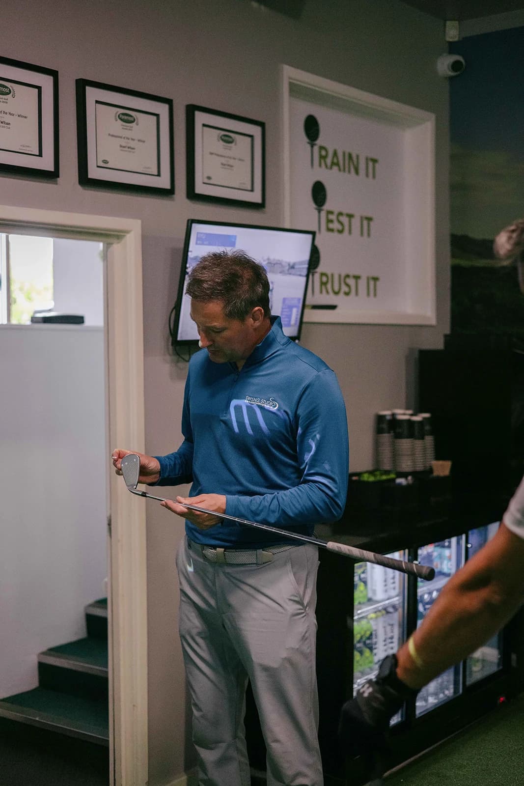 Stuart Wilson, PGA Professional, at the SWING Studio entrance